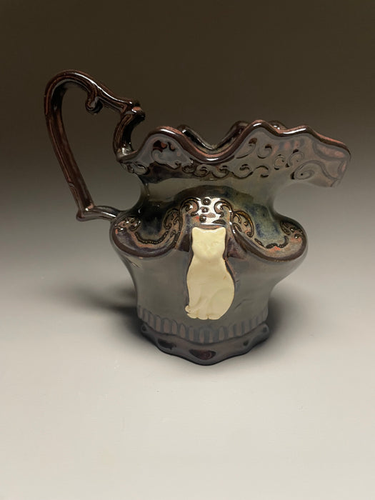 Small white cat pitcher