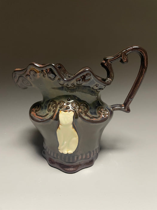 Small white cat pitcher